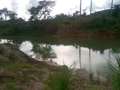 A mined-out pit outside Moigbedu Village, an old mining community in Sierra Leone’s Kono District. 