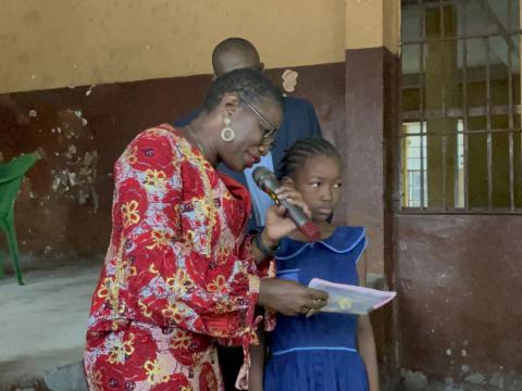 Mayor Yvonne Aki-Sawyerr distributing pencils
