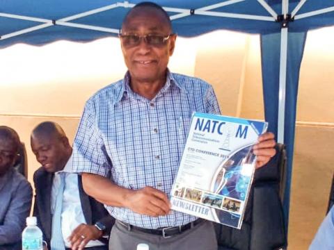 NATCOM Commissioner lunching the Newsletter in Freetown