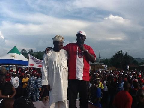 Obasanjo and Ernest Koroma at the podium in Kabala