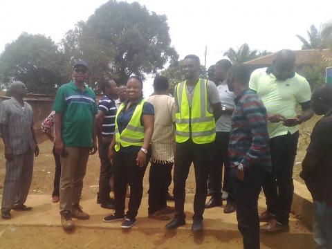 Peter Bayuku Konteh and team inspecting a road under construction in Kenema