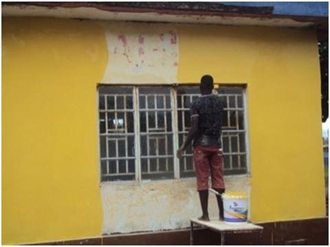 School building being painted