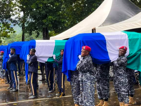 Six police officers killed in the protests were buried on 23 August